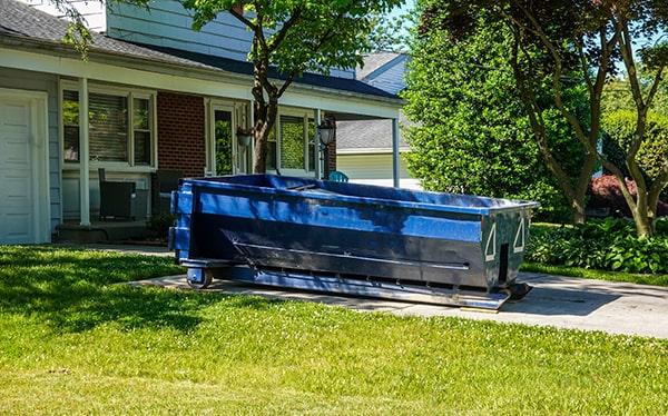 residential dumpsters can be placed on a driveway or yard, but safety measures ought to be required to avoid damage to the property